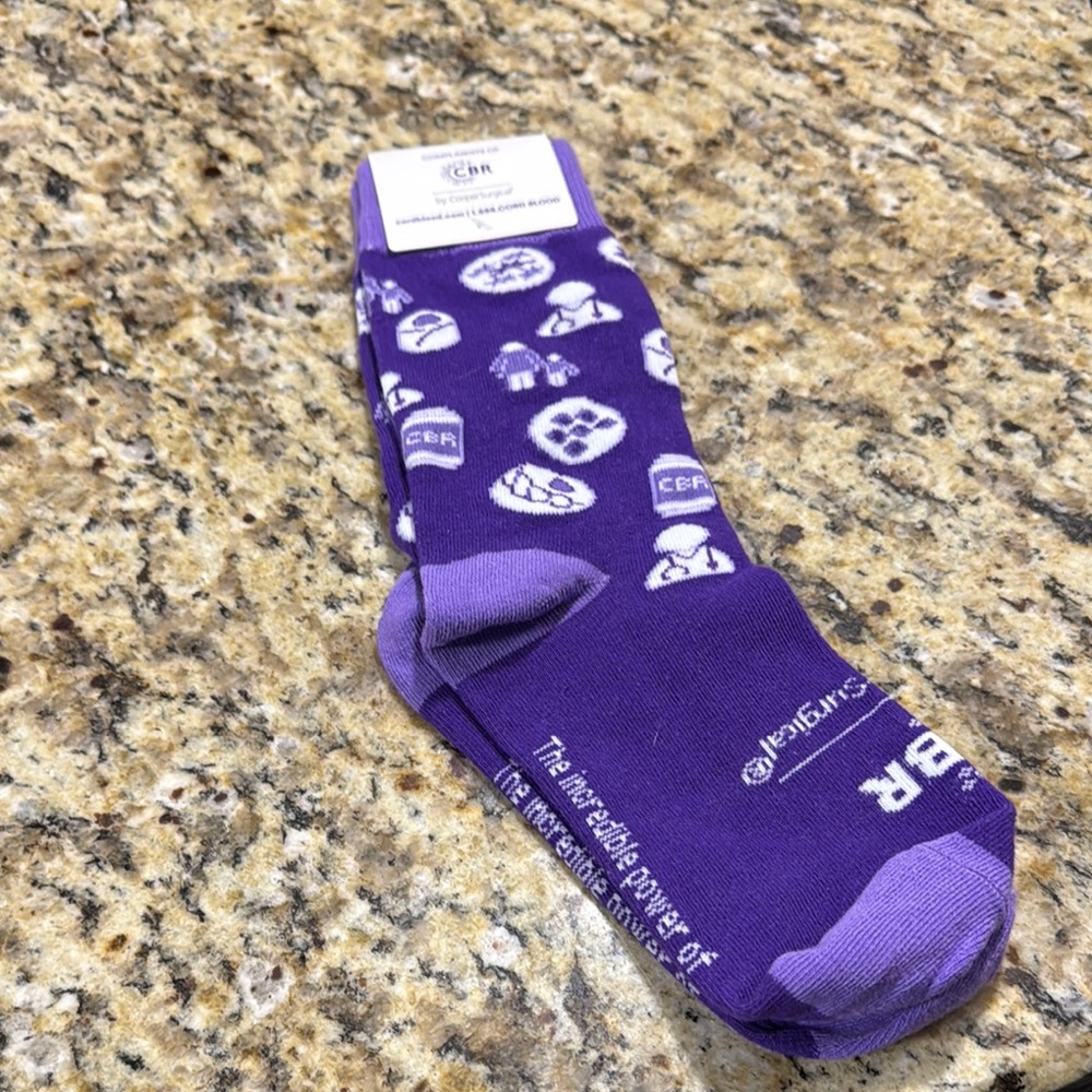 Men's Purple Socks by Cooper Surgical.